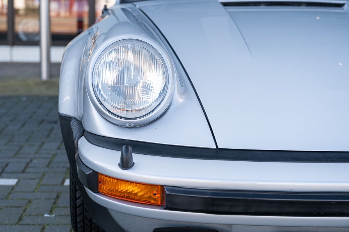 Porsche 911 (1976) — foto 18